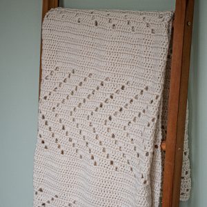 This easy filet crochet blanket pattern has an elegance to it because of its simplicity