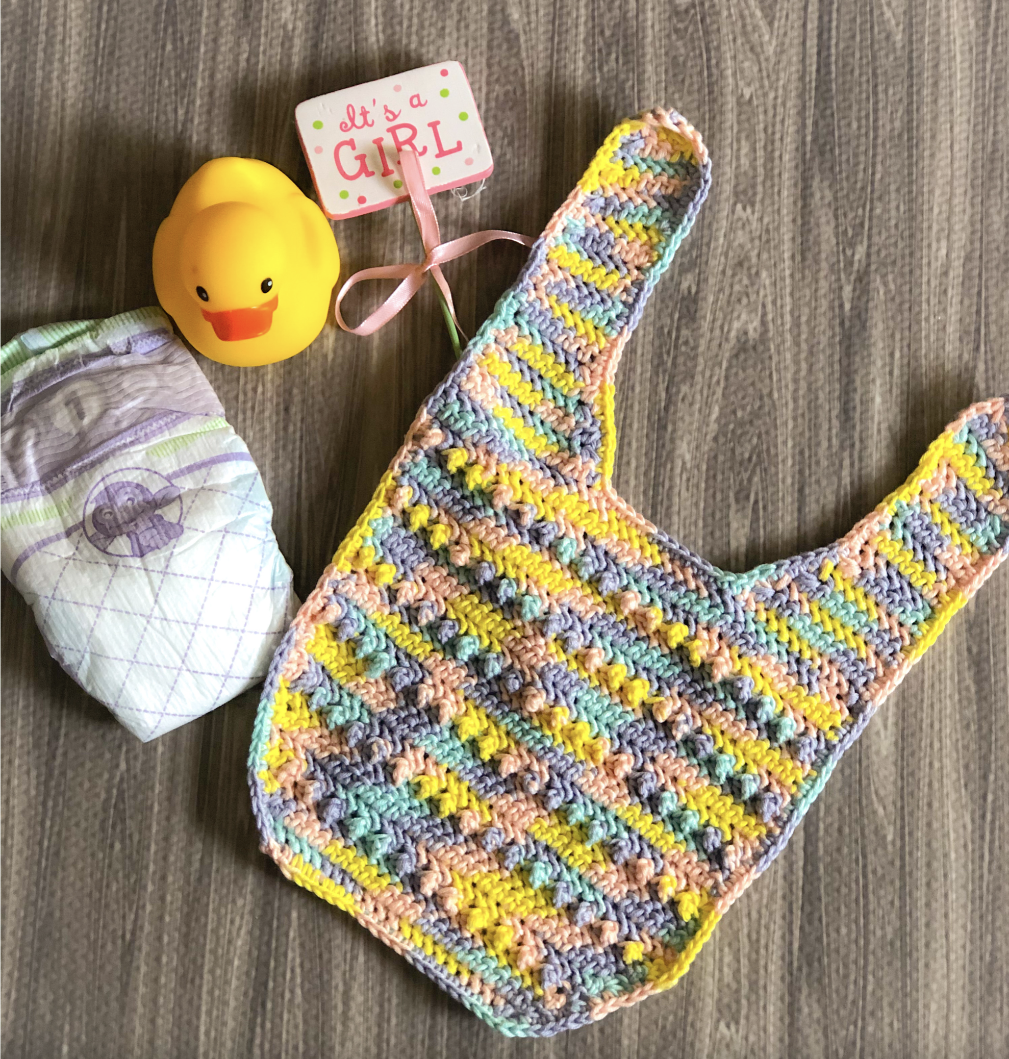 This baby bib crochet pattern looks great in variegated yarn too