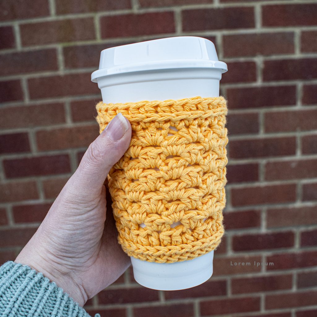 This crochet cup cozy has a great unisex texture to it so it makes the perfect gift!