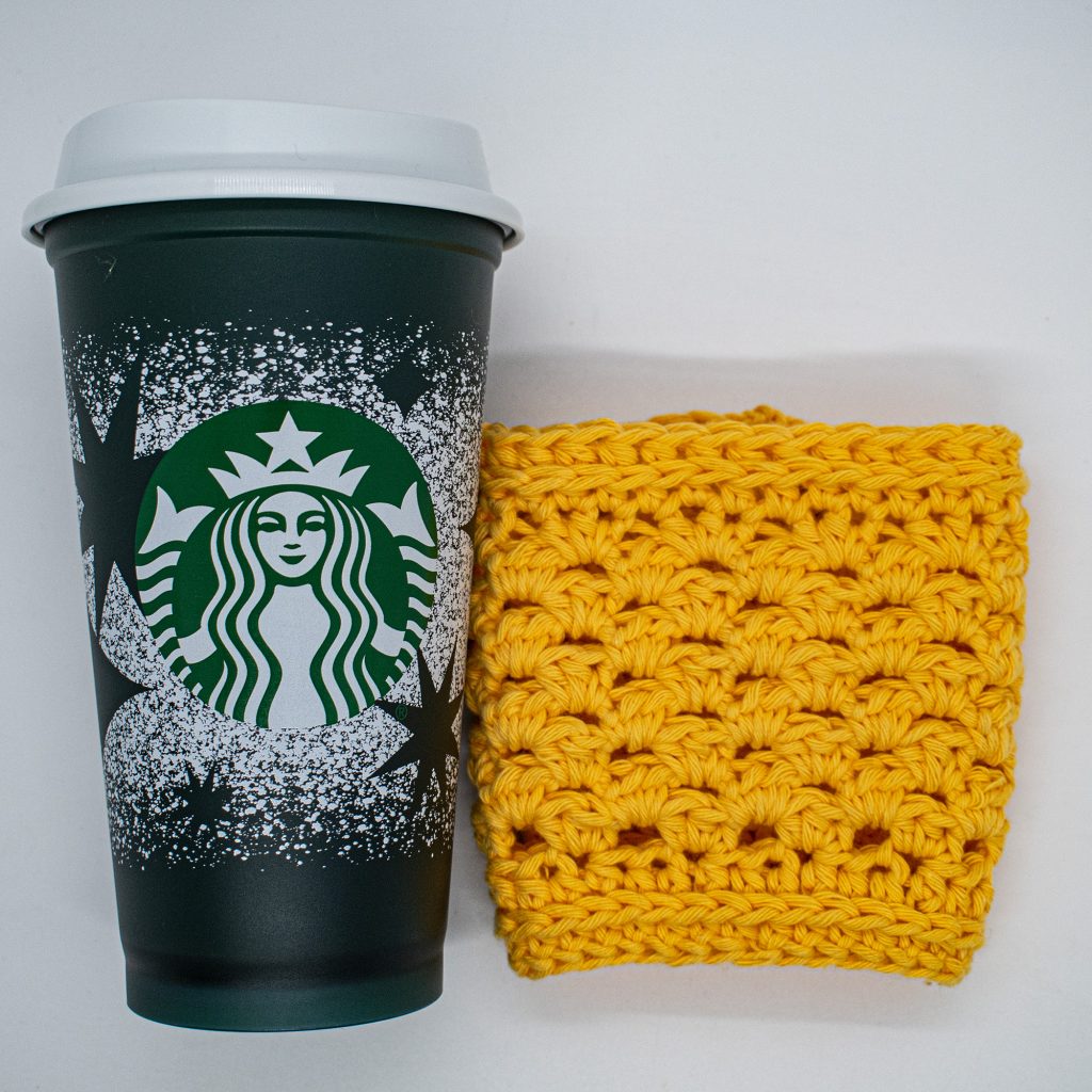 This crochet cup cozy fits a 20 oz starbucks cup
