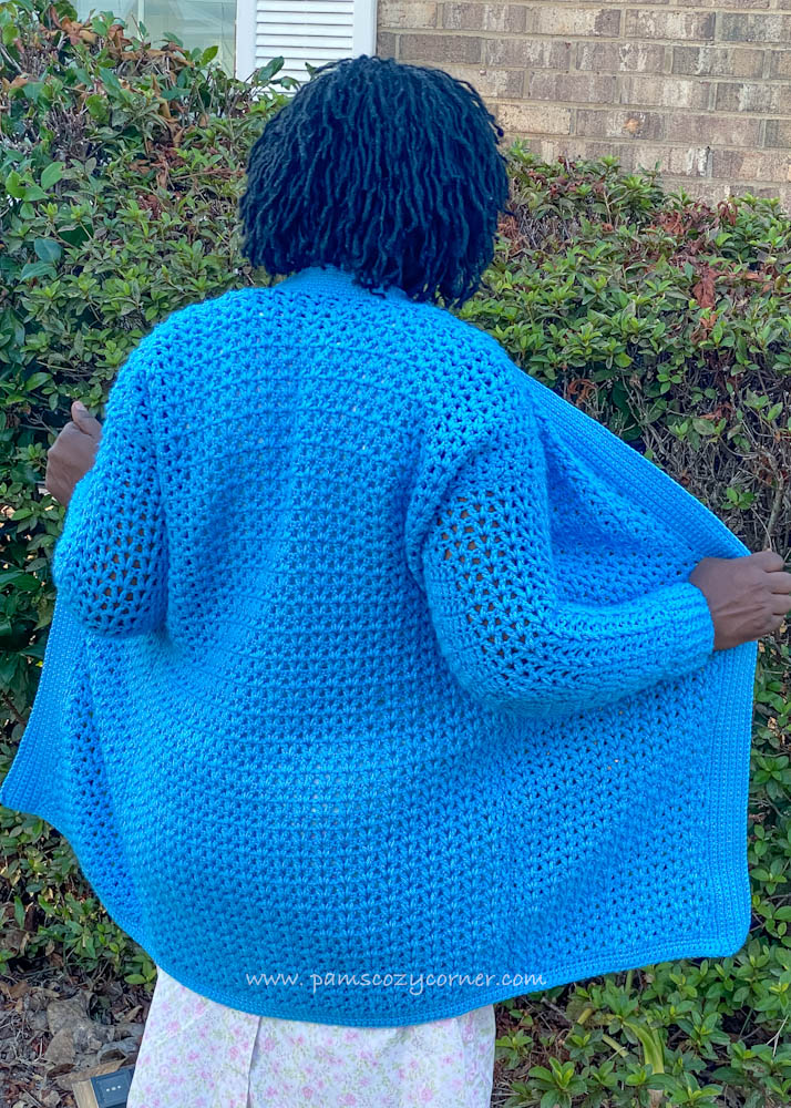 Look at the beautiful texture and drape created with this easy crochet cardigan pattern