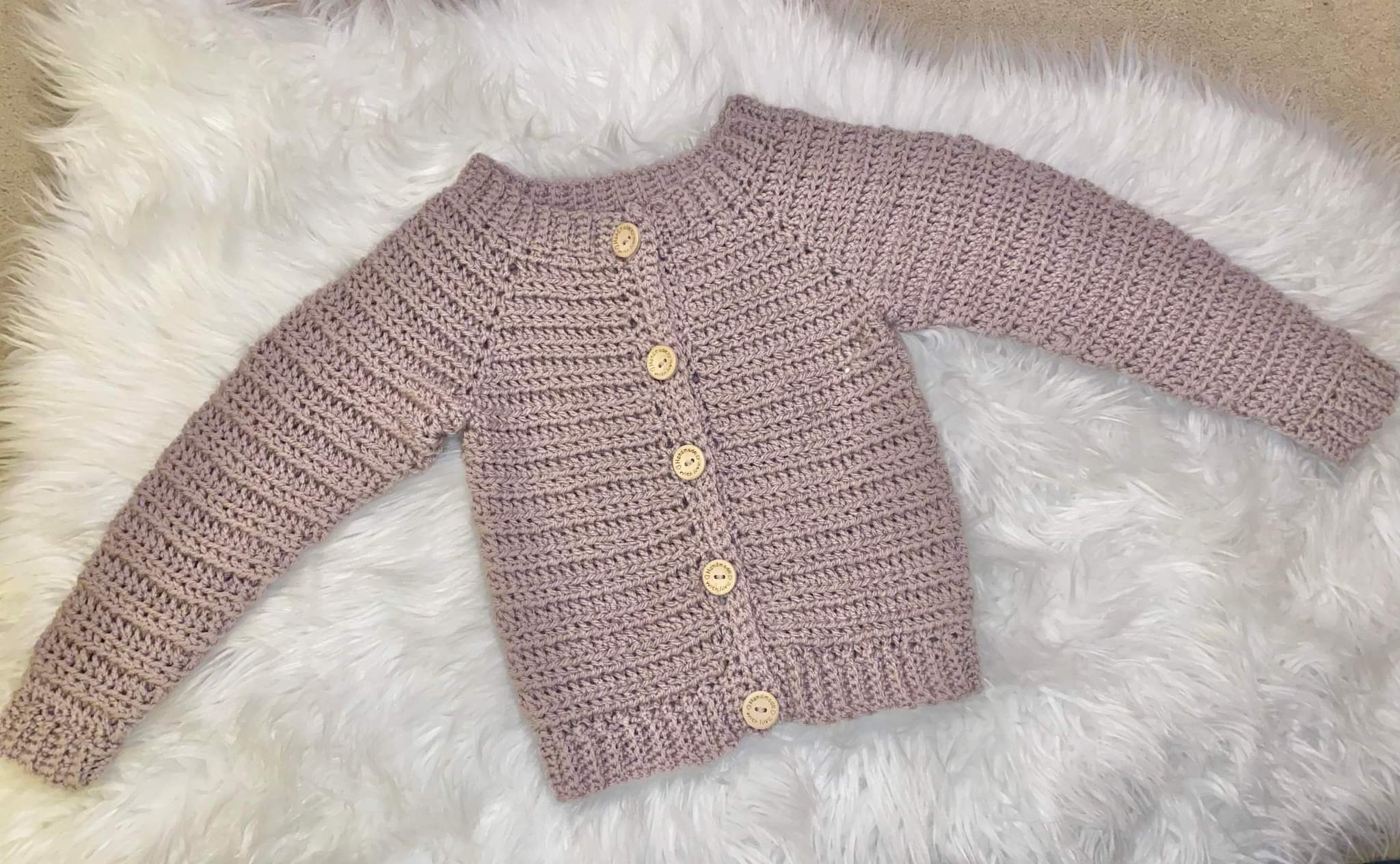 This child's crochet cardigan pattern is free on the Sunflower Cottage Crochet blog. 