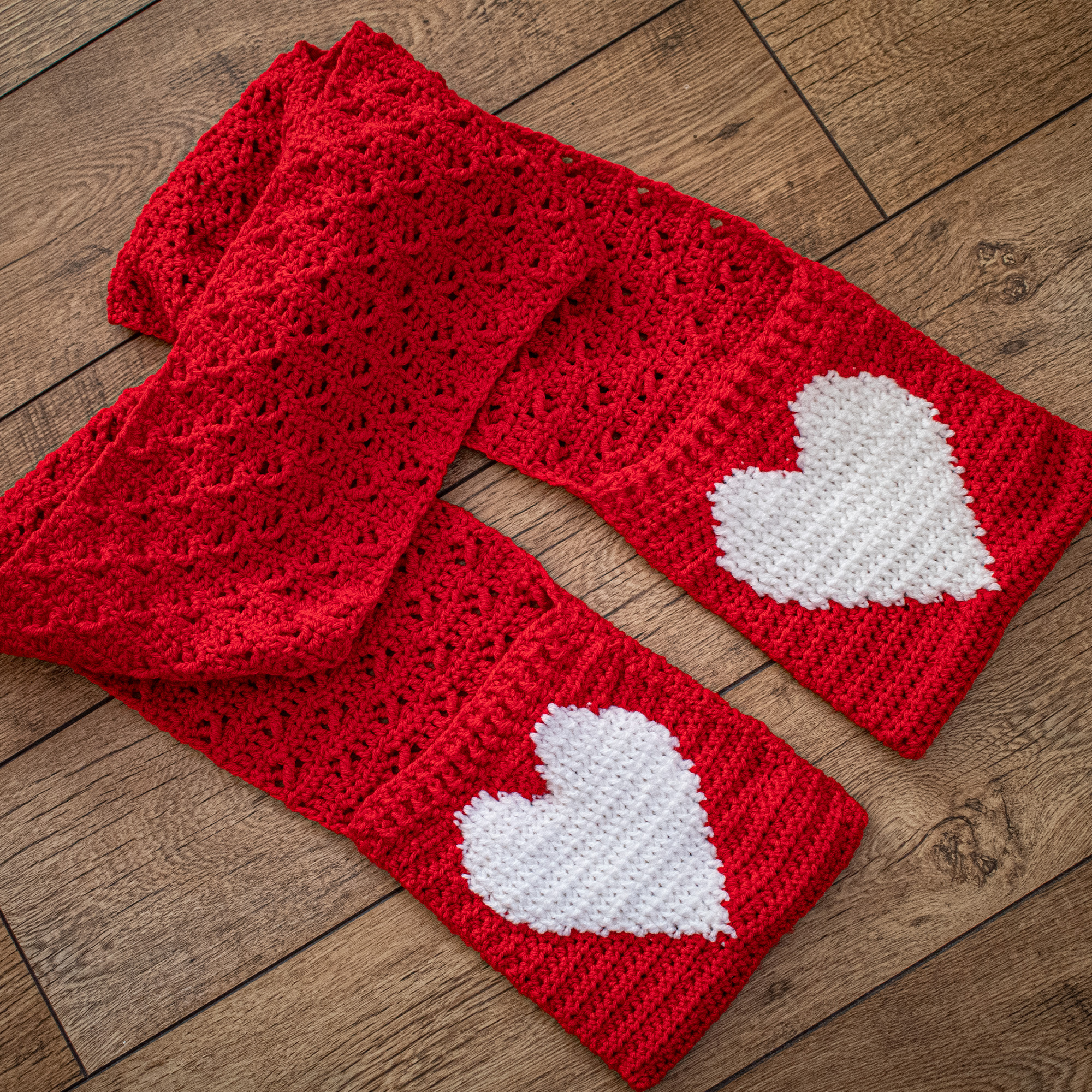 The hearts on this pocket scarf add the perfect finishing touch to this design