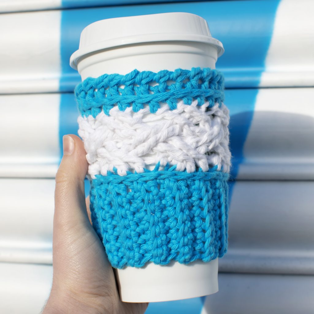 this crochet cup cozy pattern slides onto any takeaway or travel cup that doesn't have a handle!