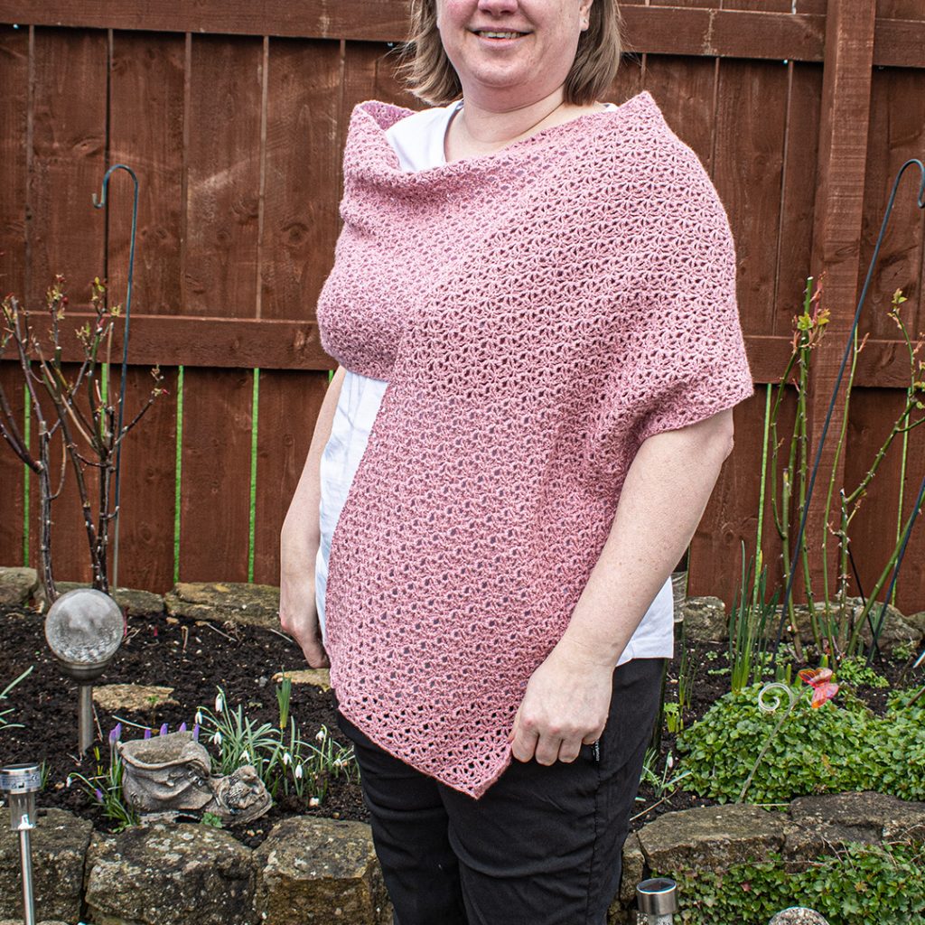 This crochet shawl pattern works up into an item that is so easy and comfortable to wear.