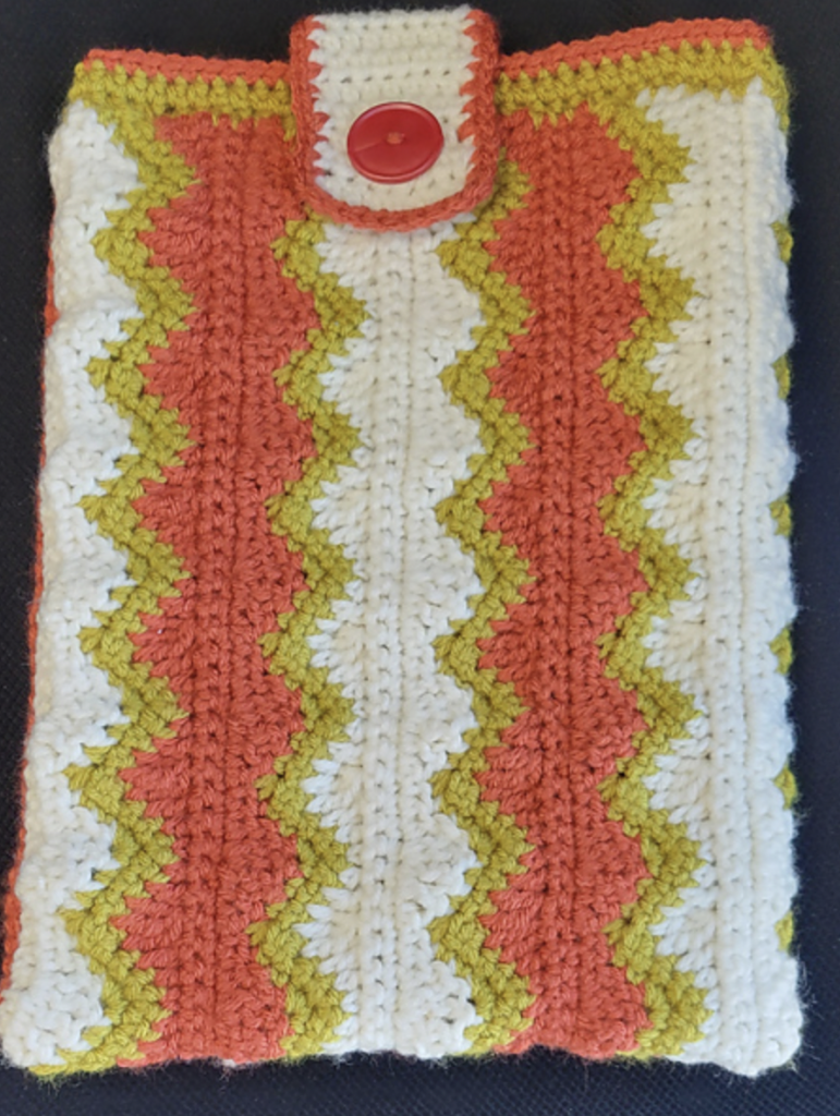 This book sleeve crochet pattern was made by atchoojmm on ravelry