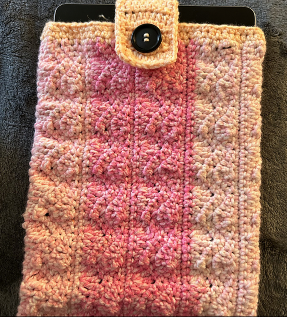 This crochet book sleeve uses one cake so the colours change themselves giving it a more subtle texture 