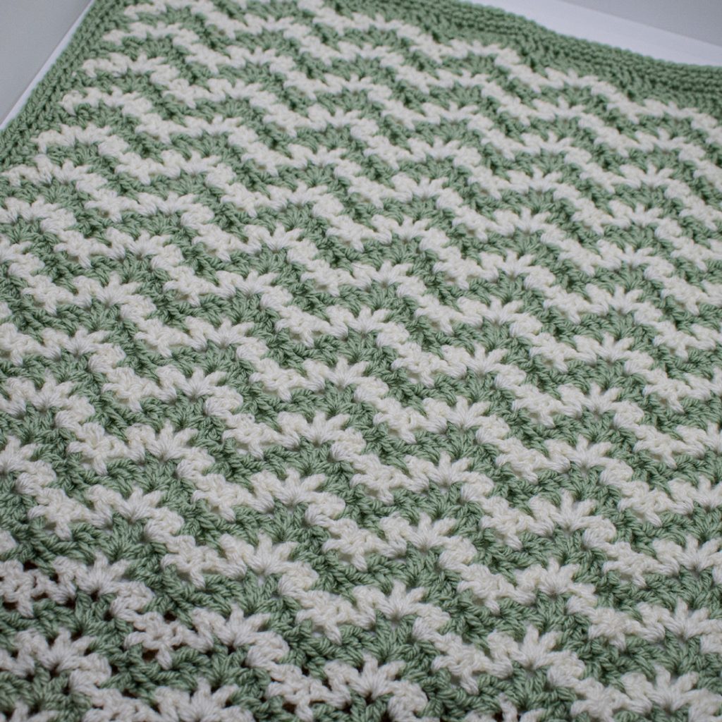Check out the gorgeous texture on this baby blanket crochet pattern!