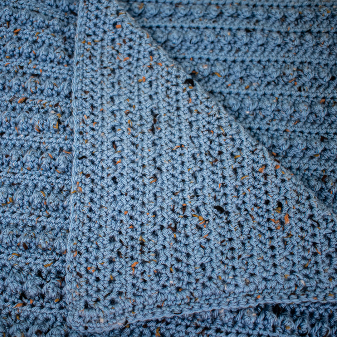 Easy and free textured baby blanket crochet pattern in 8 sizes